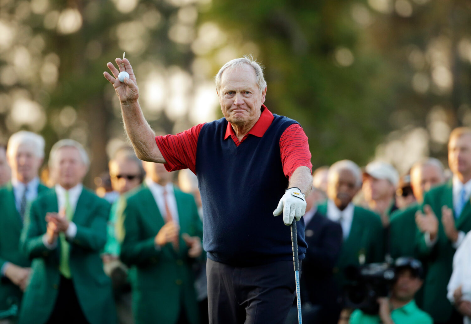 FILE - Jack Nicklaus waves before hitting the first tee for the honorary tee off before the first r...
