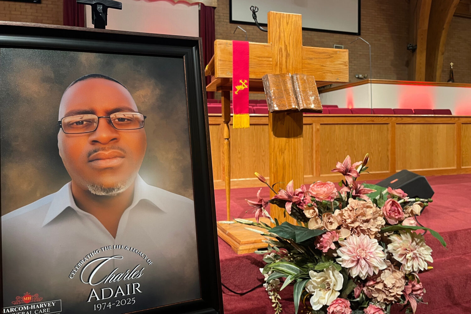 FILE - A photo of Charles Adair, a man killed when a deputy kneeled on his back in a Kansas jail, i...
