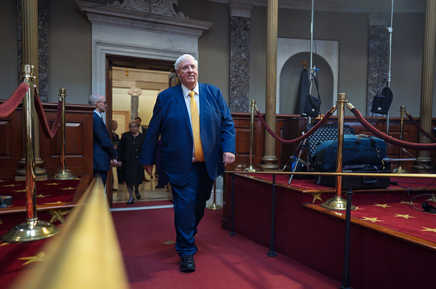 FILE Sen. Jim Justice, R-W.Va., arrives in the Old Senate Chamber for a mock swearing-in ceremony, ...