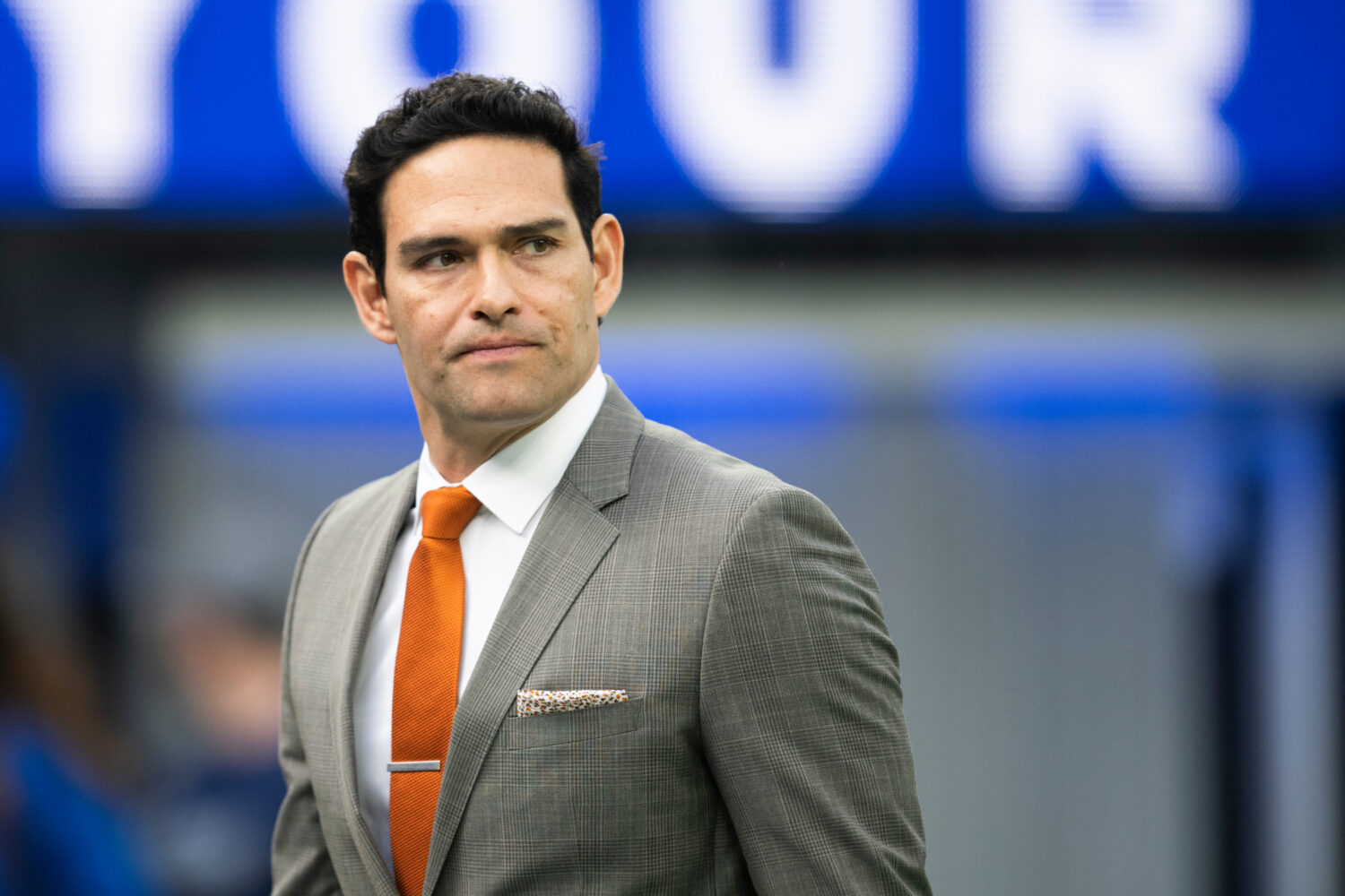 FILE - Mark Sanchez walks on the field before an NFL football game between the Los Angeles Rams and...