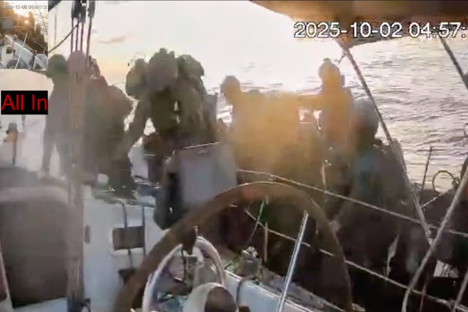 This frame grab from video released by the Global Sumud Flotilla shows Israeli navy soldiers boardi...