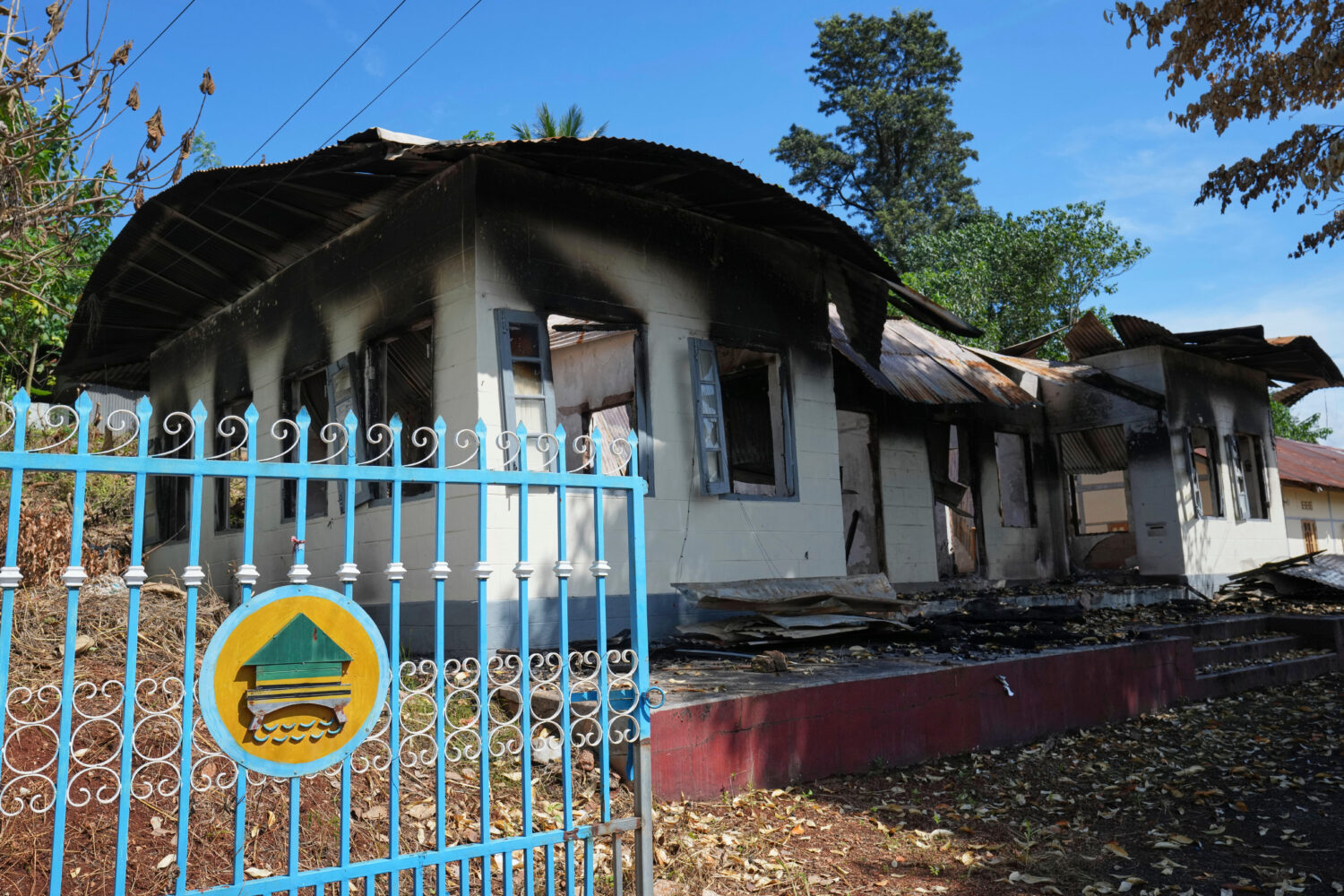 In this photo taken during a trip supervised by pro-military Myanmar media, a damaged government re...