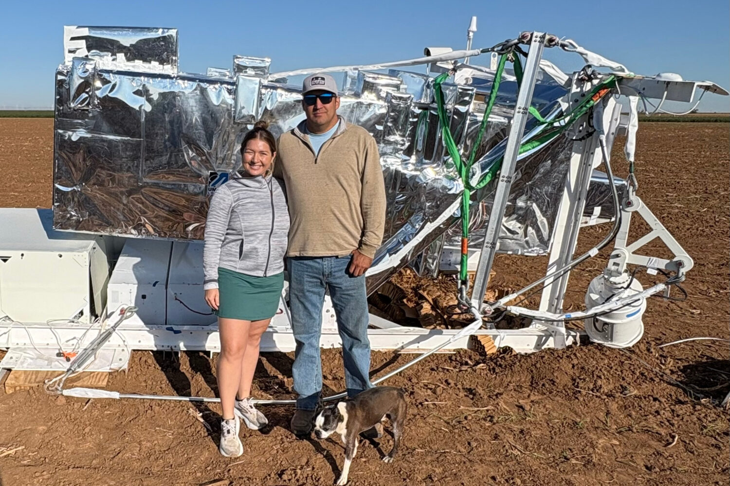 In this photo provided by Ann Walter, Ann Walter and her husband, Hayden, stand in front of a piece...