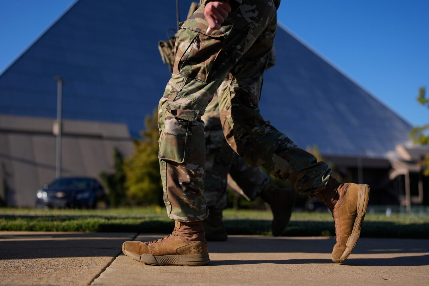 A member of National Guard patrol outside a Bass Pro Shops, Friday, Oct. 10, 2025, in Memphis, Tenn...