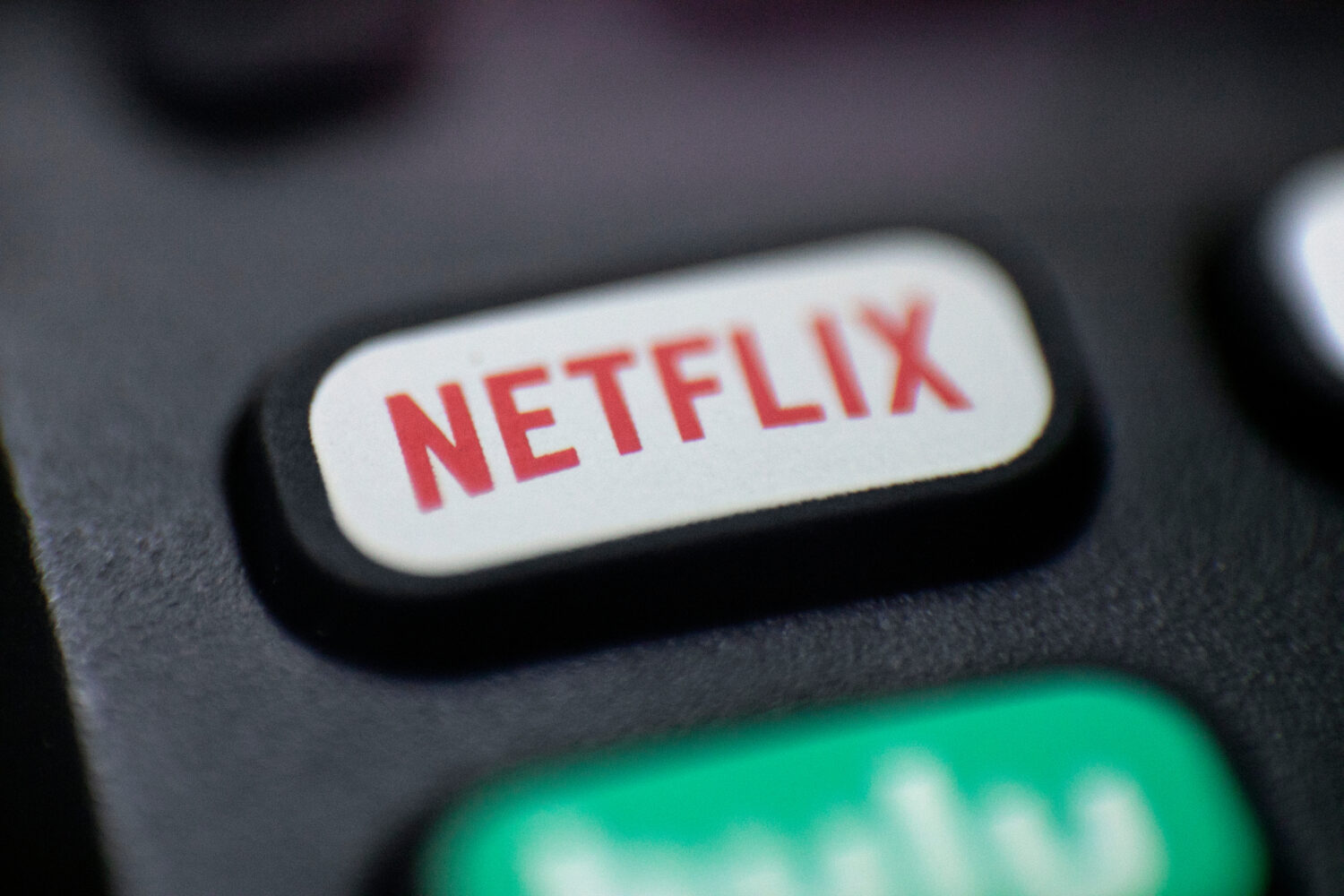 FILE - This Aug. 13, 2020 photo shows a logo for Netflix on a remote control in Portland, Ore. (AP ...