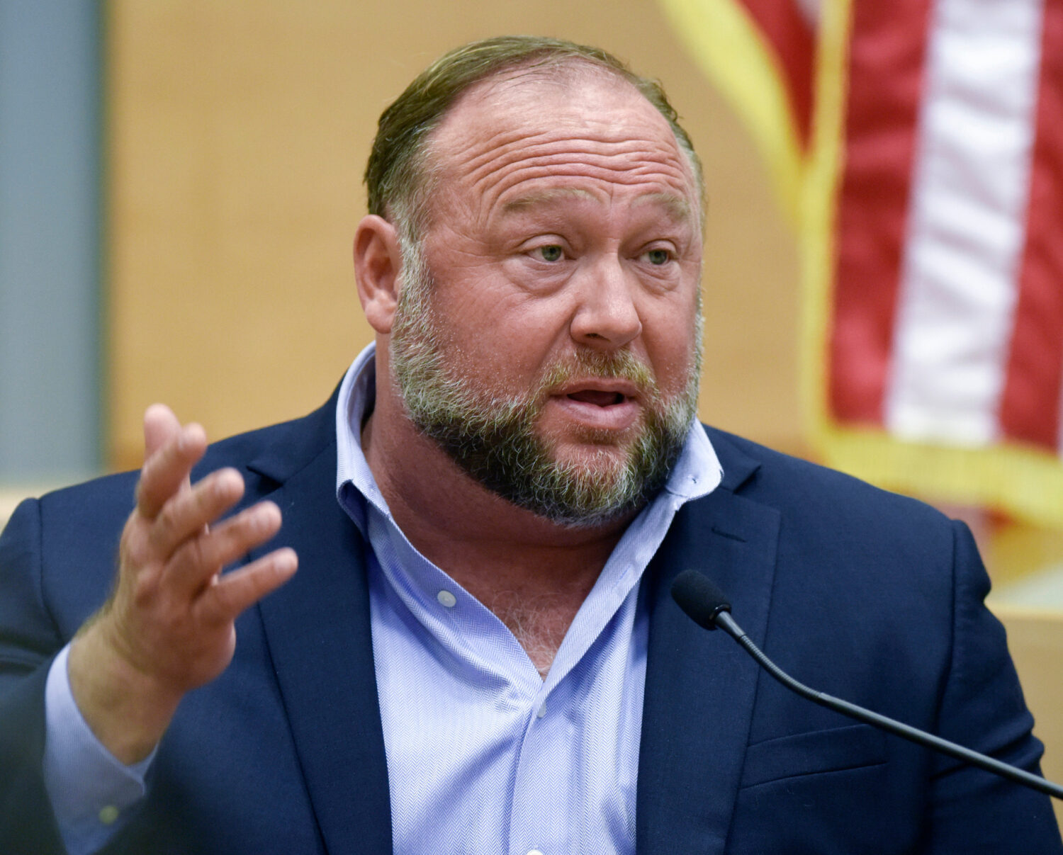 FILE - Conspiracy theorist Alex Jones takes the witness stand to testify at the Sandy Hook defamati...