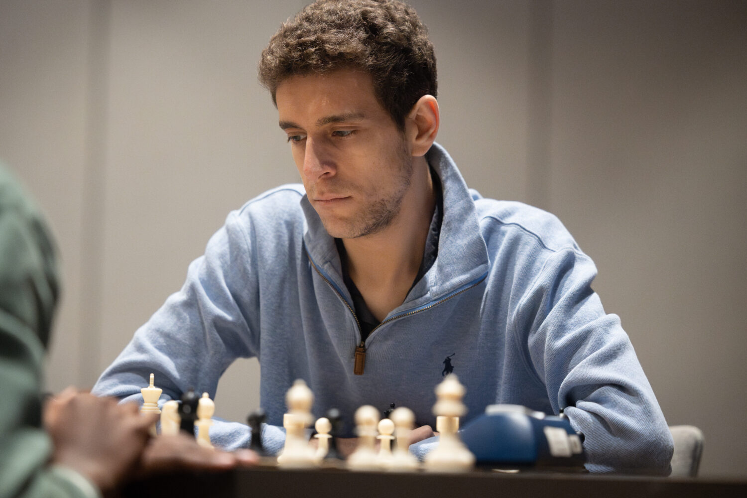 This undated photo released by Charlotte Chess Center shows Daniel Naroditsky playing chess on the ...