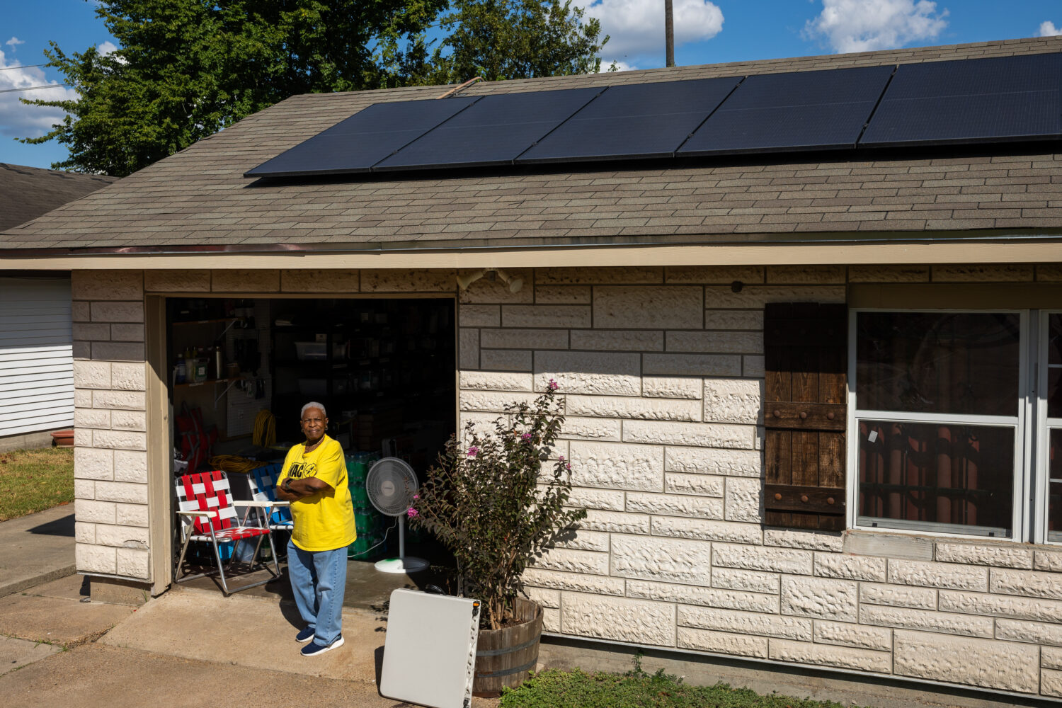 Doris Brown, Hub home captain, poses for a portrait under her solar panels on Wednesday, Oct. 8, 20...