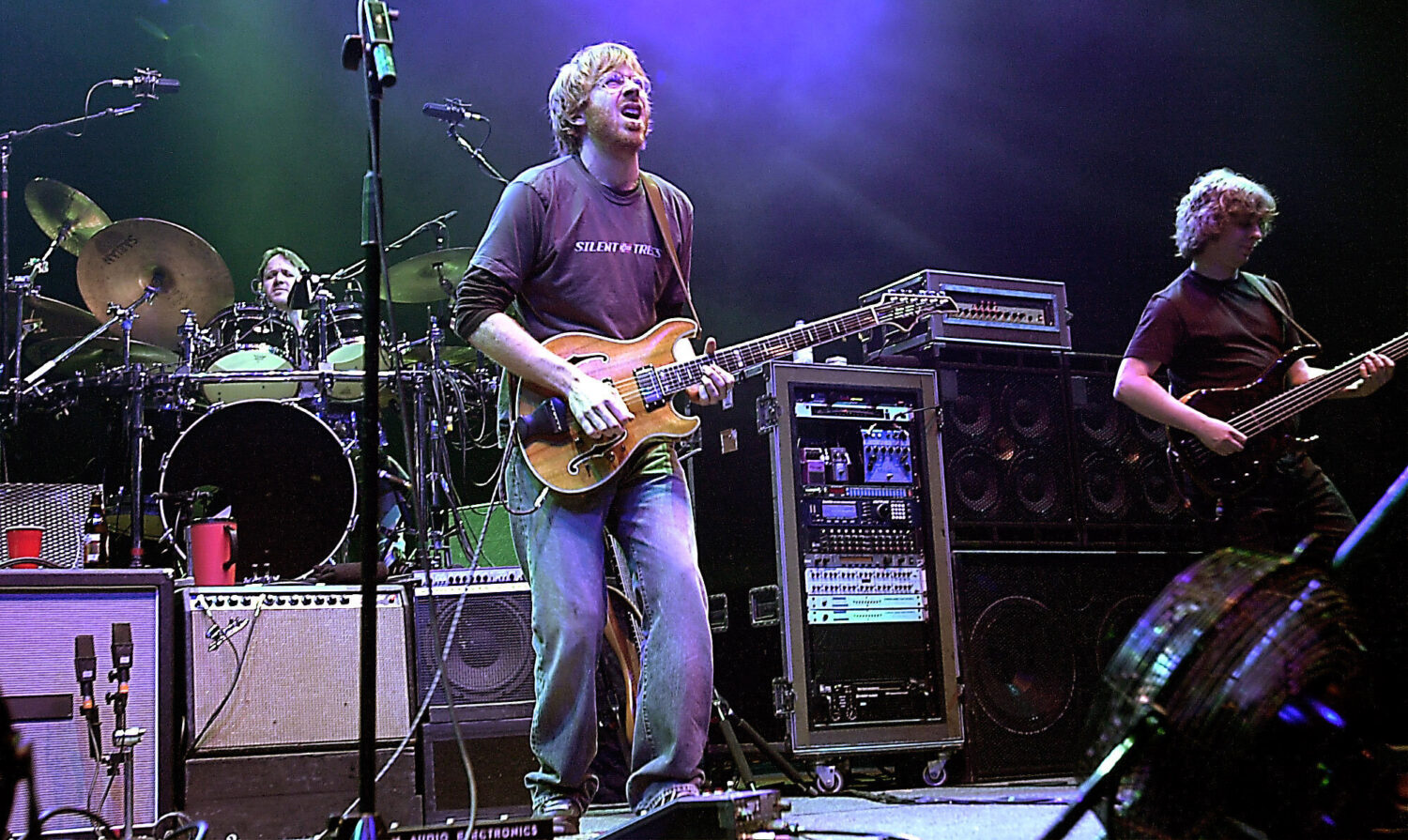 FILE - The group Phish, drummer Jon Fishman, guitarist Trey Anastasio, center, and bassist Mike Gor...