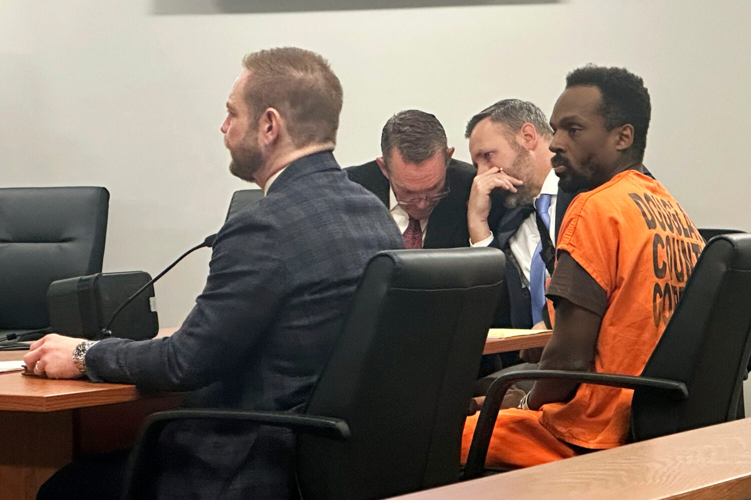 FILE - Kierre Williams, right, sits with his attorneys in court, Jan. 3, 2024, in Blair, Neb. (AP P...