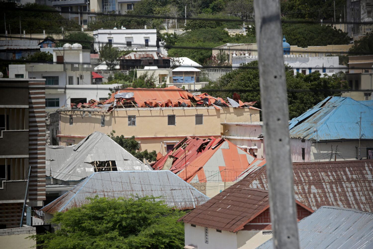 A view of a damaged buildings shows the aftermath of an hours-long militant attack in Mogadishu, So...