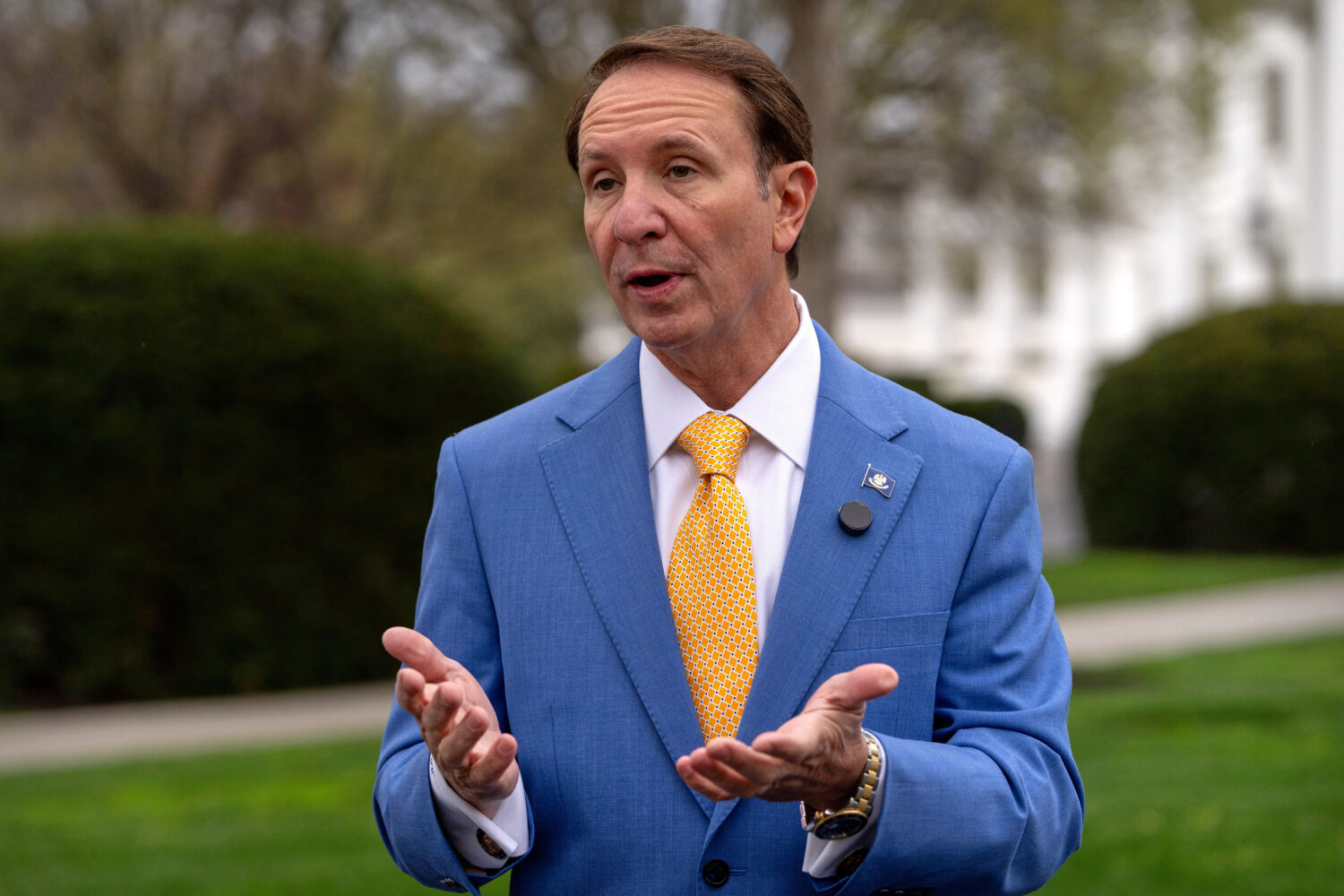 FILE - Louisiana Gov. Jeff Landry records a social media video outside the White House, March 24, 2...