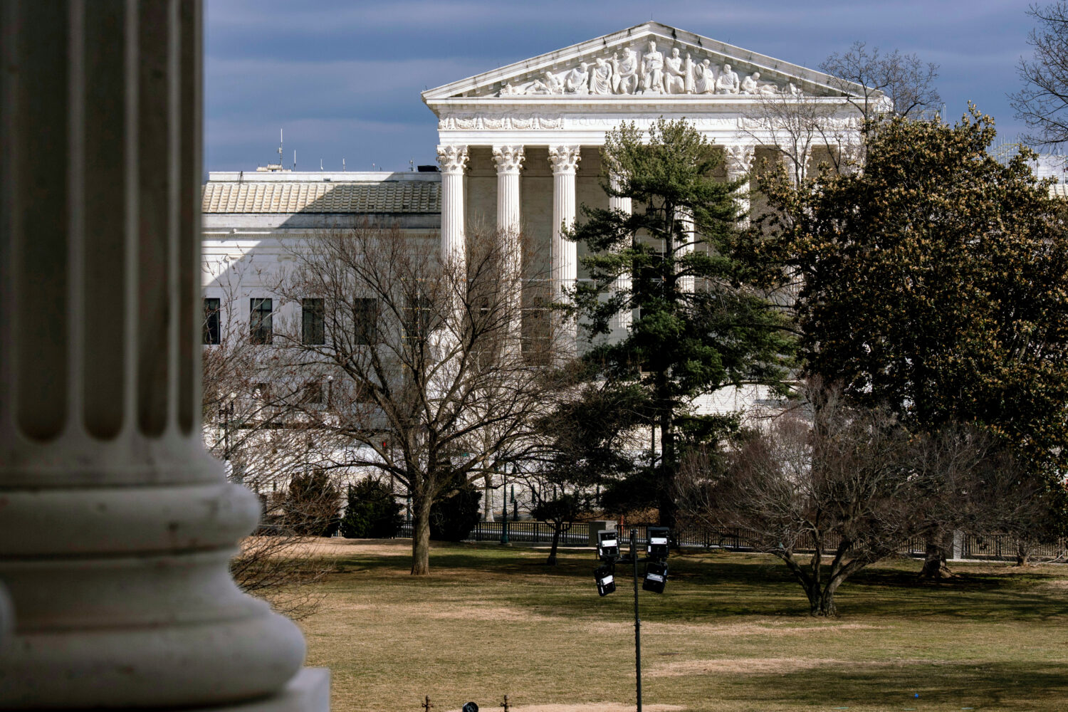 FILE - The Supreme Court is seen in the distance, framed through columns of the U.S. Senate at the ...