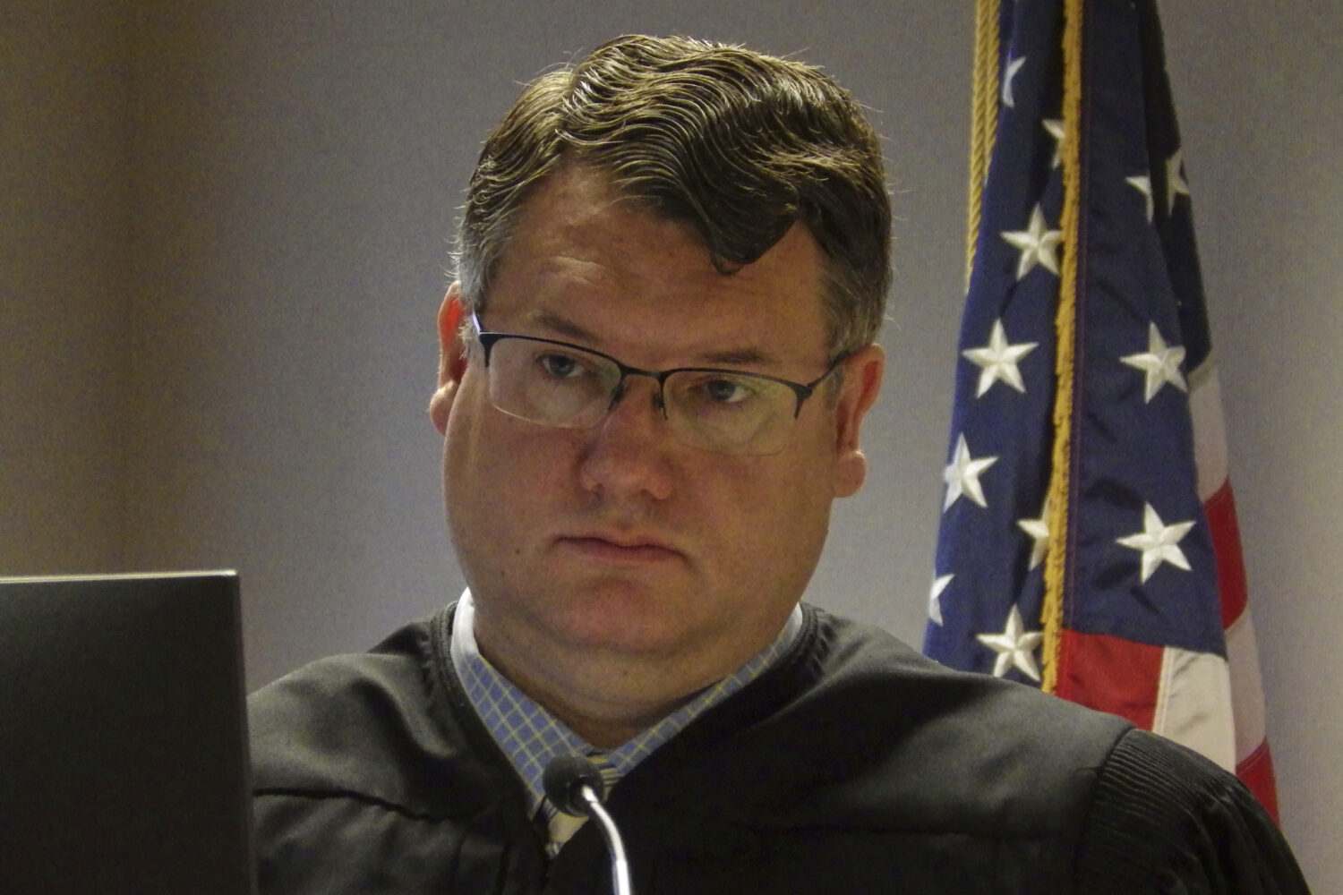 North Dakota State District Judge Jackson Lofgren listens during a court hearing on March 31, 2025,...