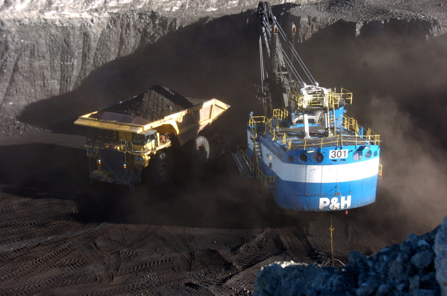 FILE - A haul truck is seen after being loaded with coal by a mechanized shovel at the Spring Creek...
