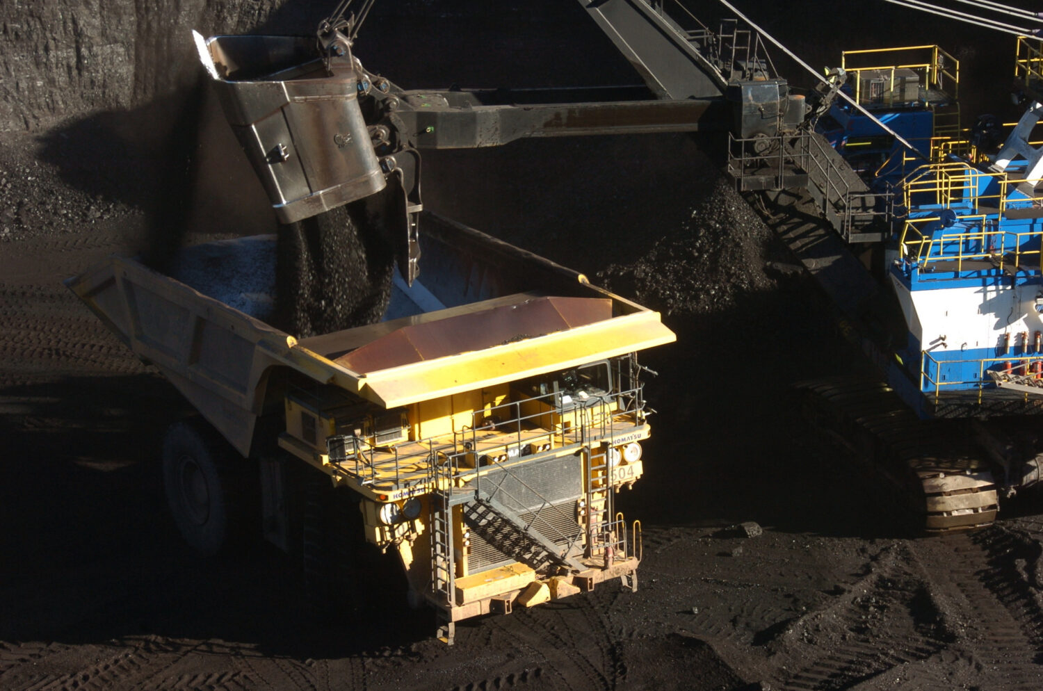 A mechanized shovel loads coal into a haul truck at the Spring Creek mine, in this Nov. 15, 2016 ph...