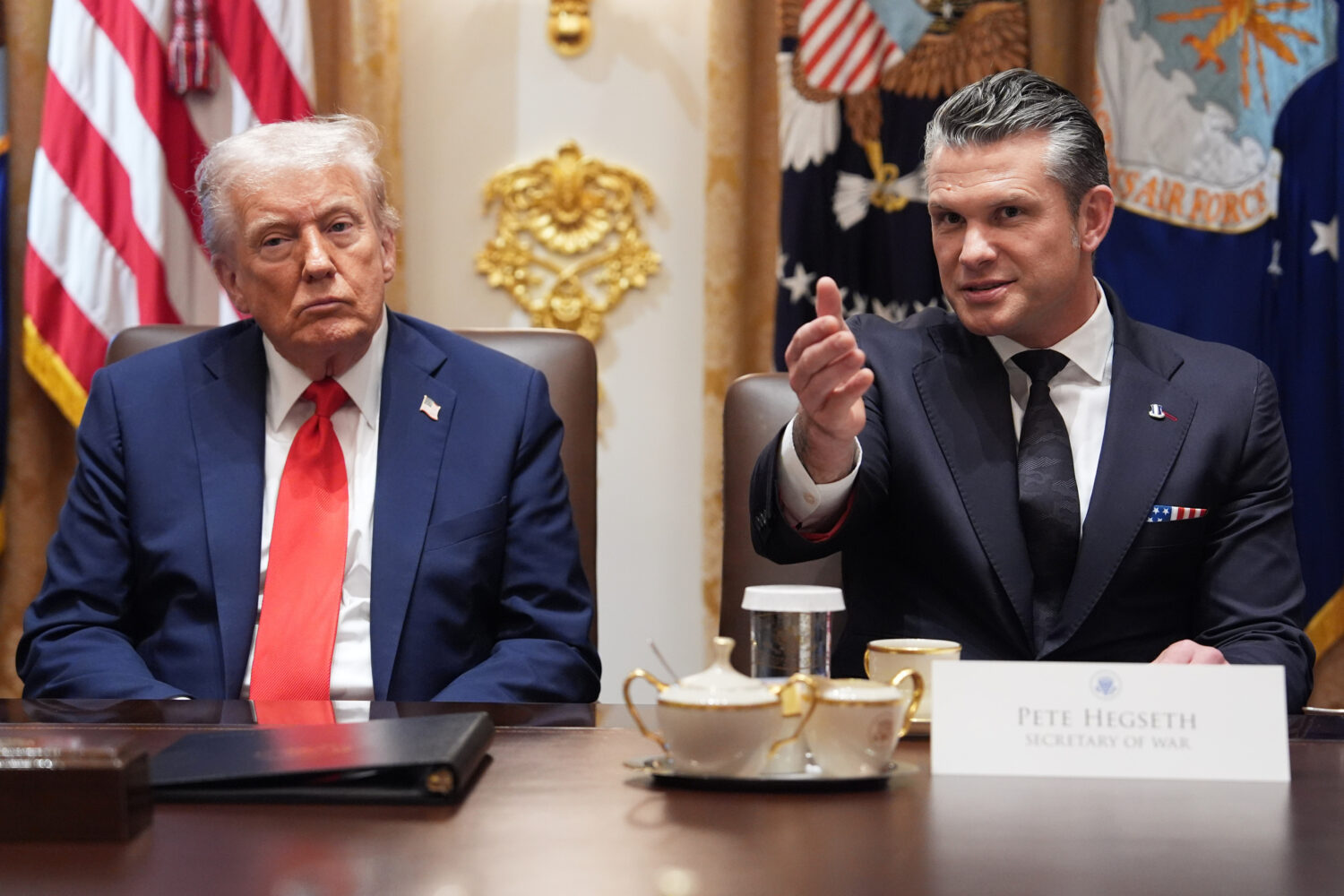 Defense Secretary Pete Hegseth speaks as President Donald Trump holds a cabinet meeting at the Whit...