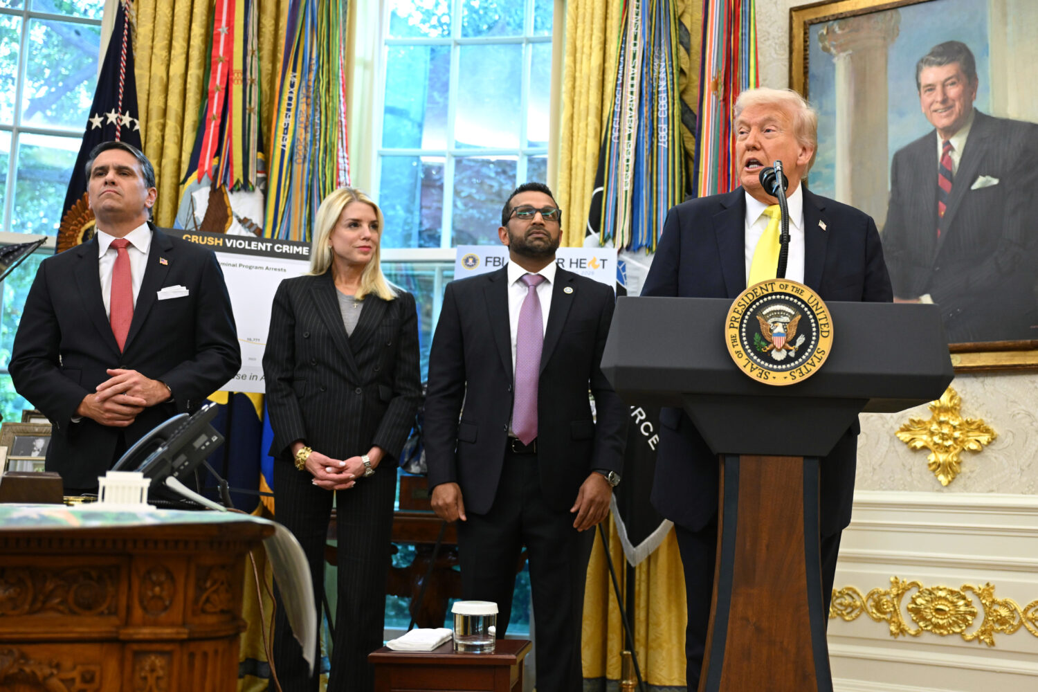 President Donald Trump speaks as FBI Director Kash Patel, Attorney General Pam Bondi, and Deputy At...