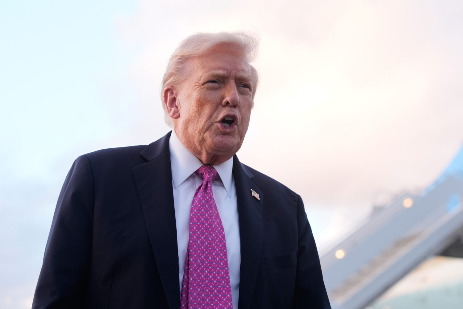 President Donald Trump speaks to reporters after arriving on Air Force One, Friday, Oct. 17, 2025, ...