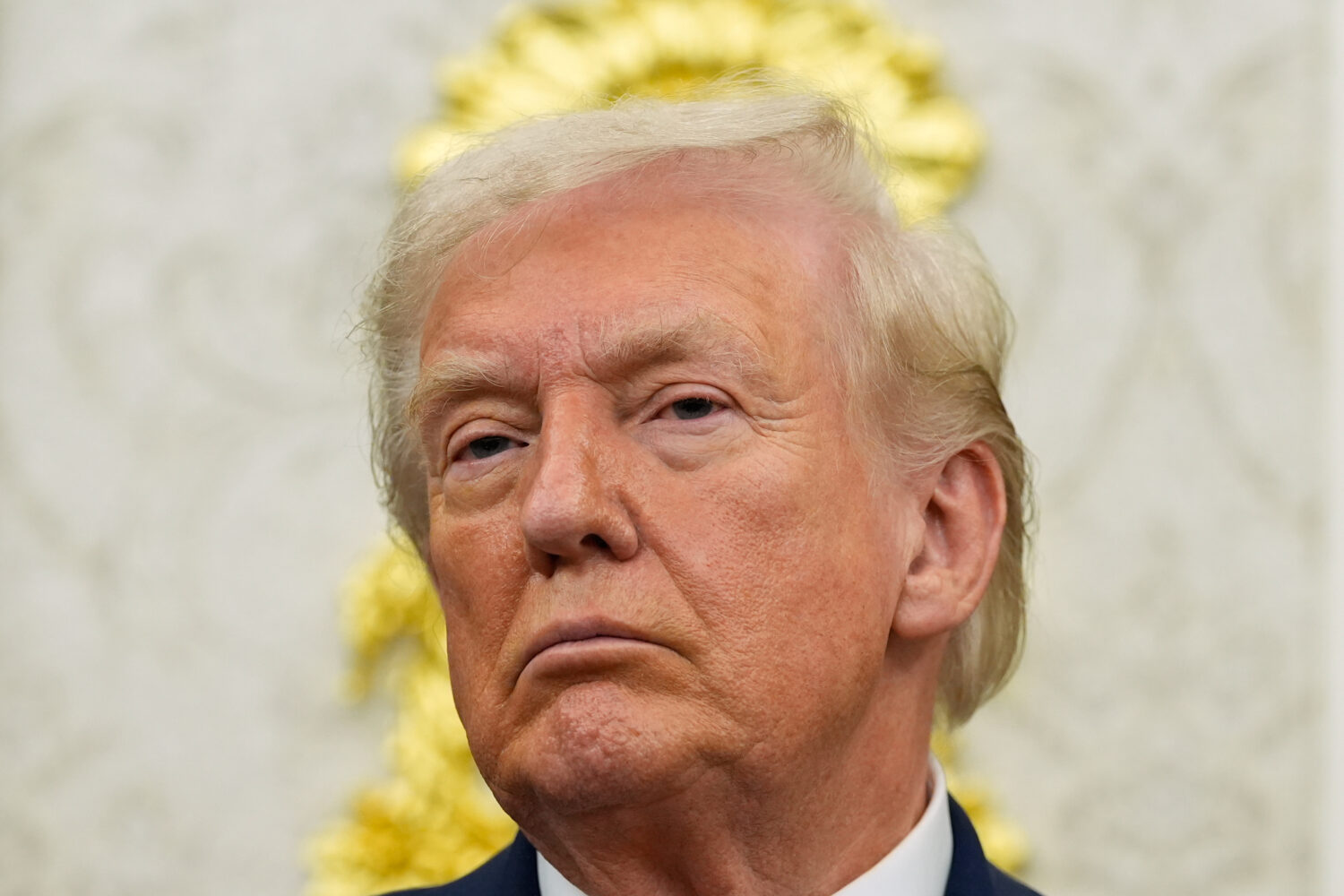 President Donald Trump listens during an event in the Oval Office of the White House, Friday, Oct. ...