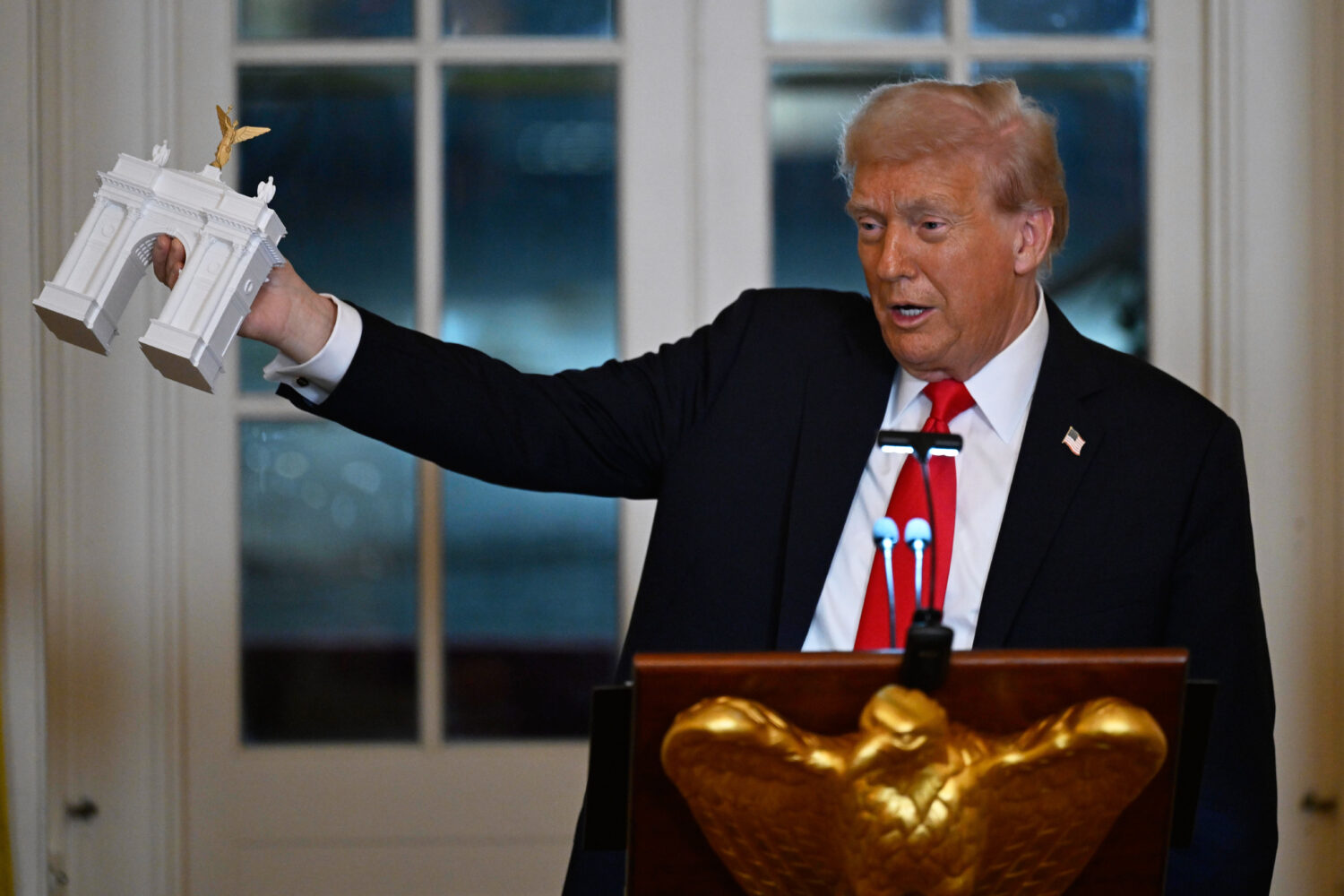 President Donald Trump addresses a dinner for donors who have contributed to build the new ballroom...