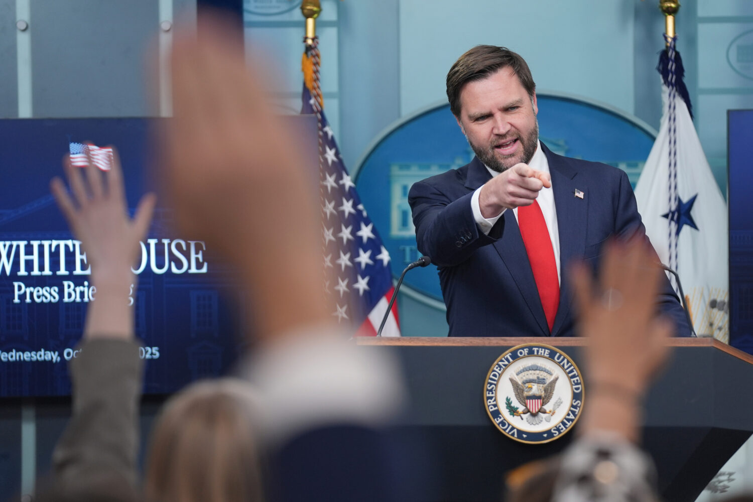 Vice President JD Vance, gestures while speaking with reporters in the James Brady Press Briefing R...