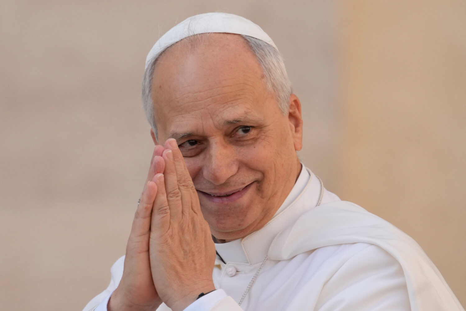 Pope Leo XIV gestures as he arrives for his weekly general audience in St. Peter's Square at The Va...