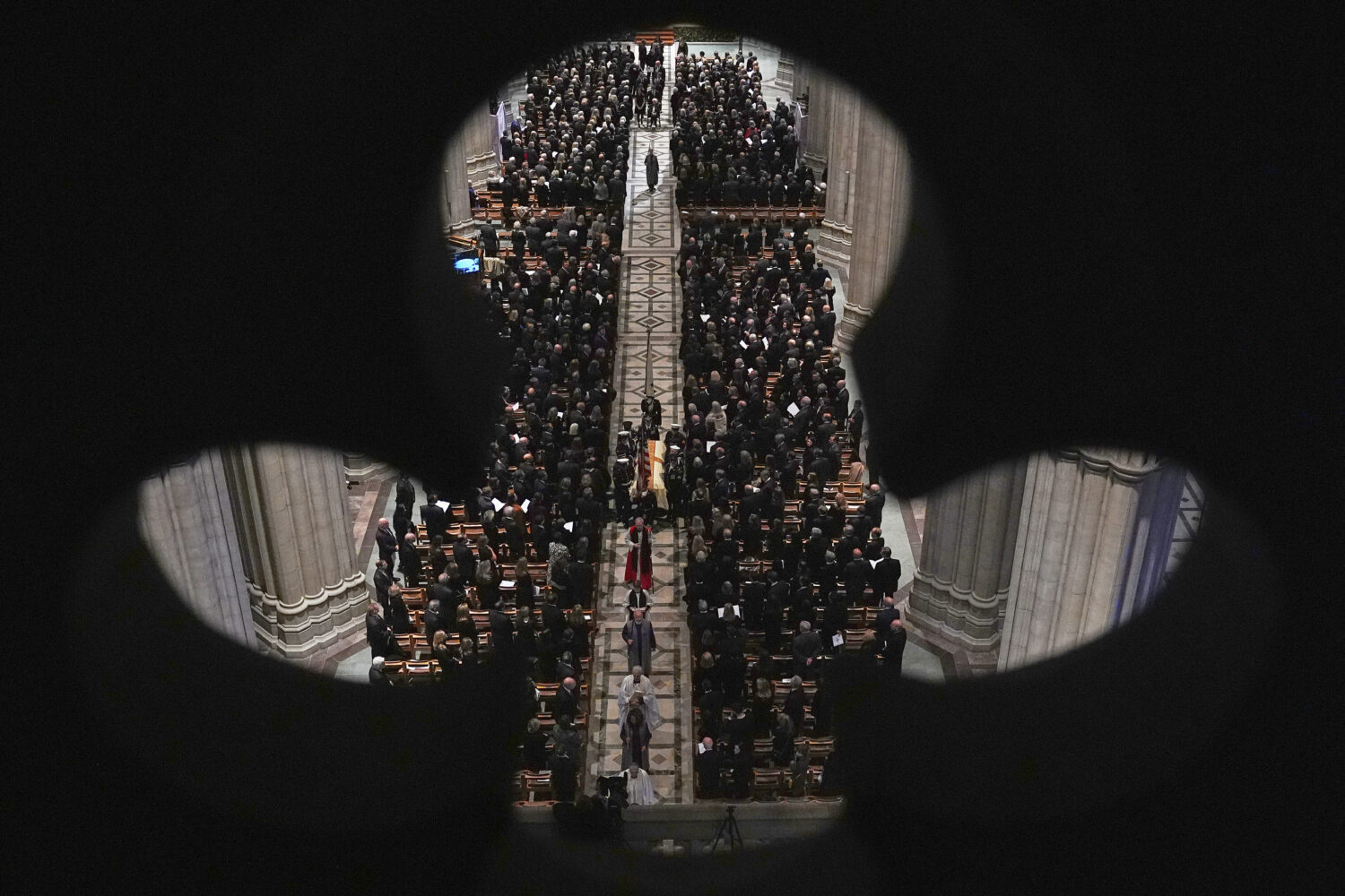 The casket with former Vice President Dick Cheney is carried out of the Washington National Cathedr...