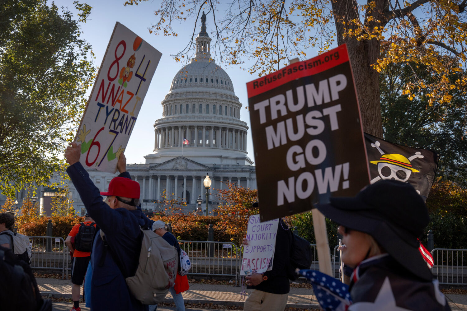Demonstrators opposed to President Donald Trump protest near the Capitol on Wednesday, Nov. 5, 2025...