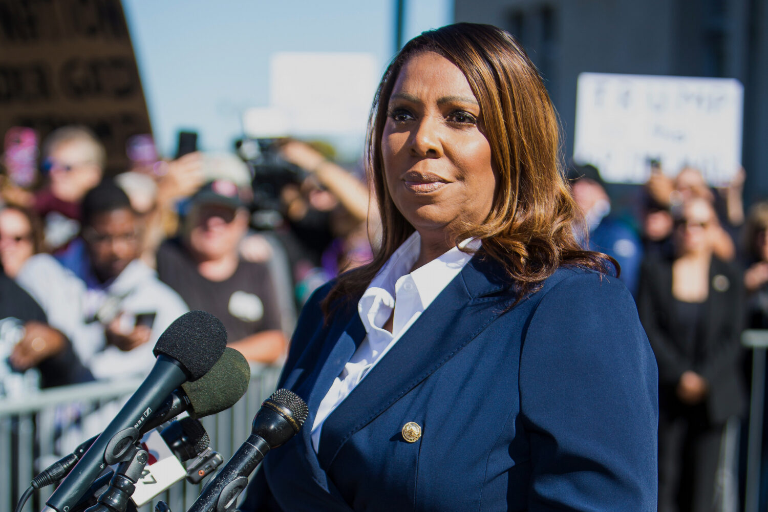 New York Attorney General, Letitia James, speaks after pleading not guilty outside the United State...