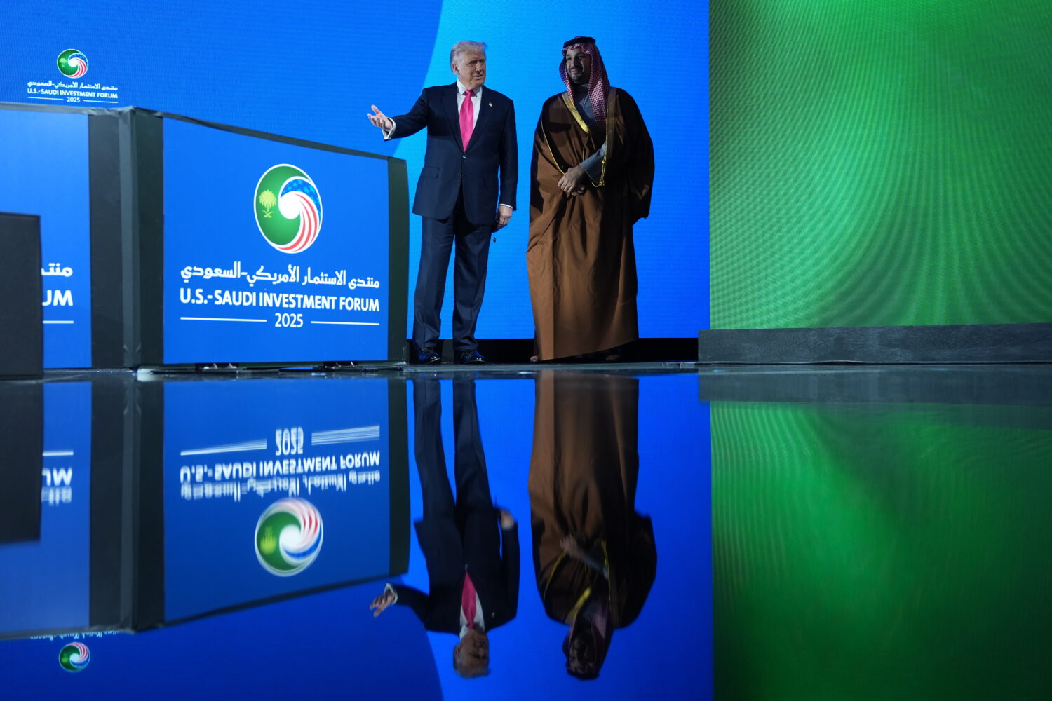 President Donald Trump walks on stage during the Saudi Investment Forum with Saudi Arabia's Crown P...