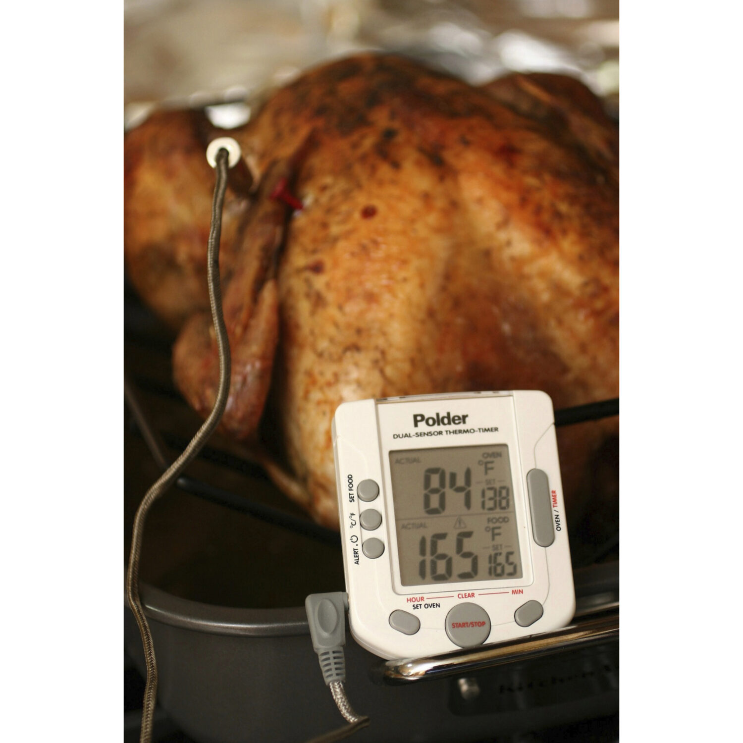 FILE - A turkey is roasted with the help of a thermometer on Oct. 18, 2007. (AP Photo/Larry Crowe, ...