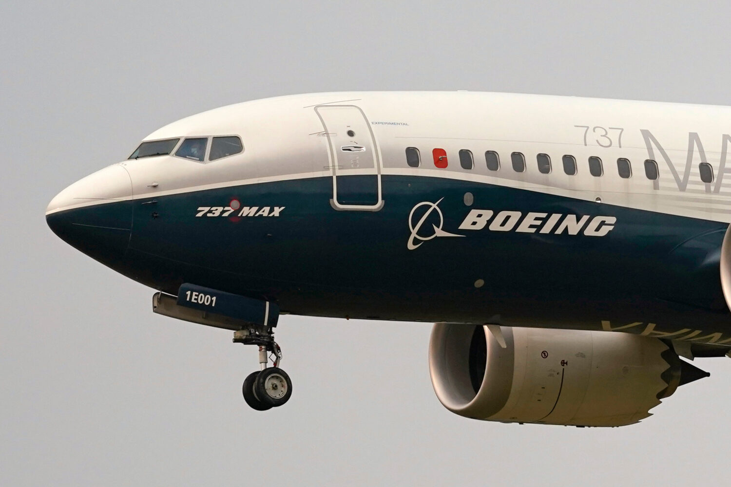 FILE - A Boeing 737 Max jet prepares to land at Boeing Field following a test flight in Seattle, Se...