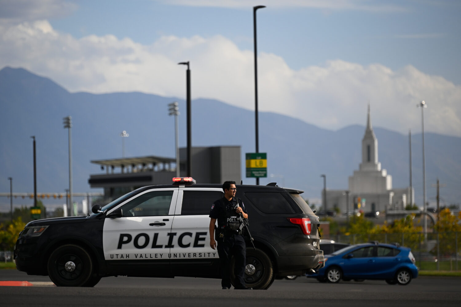 FILE - A law enforcement officer stands outside Utah Valley University on Sept. 10, 2025, in Orem, ...