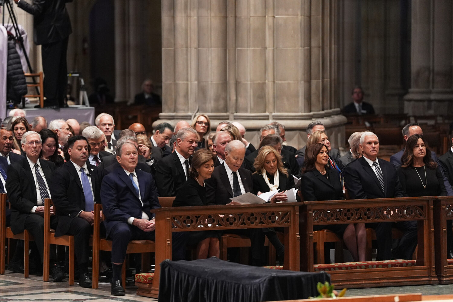 Former Presidents front row from left, George W. Bush with Laura Bush, Joe Biden with Jill Biden an...