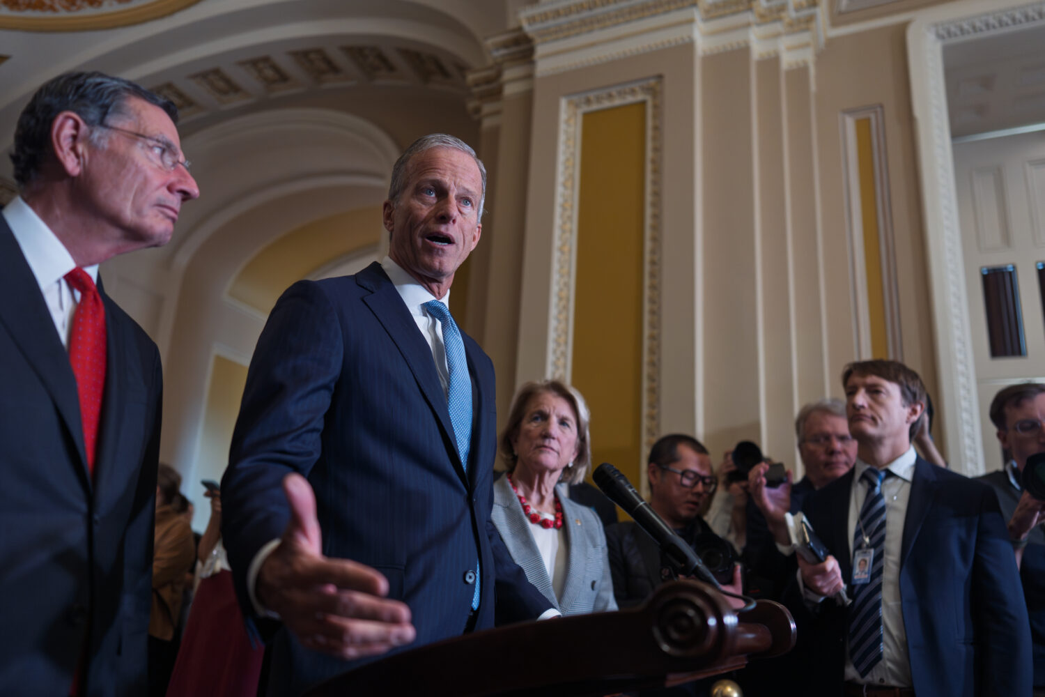 Senate Majority Leader John Thune, R-S.D., flanked by Sen. John Barrasso, R-Wyo., the GOP whip, lef...