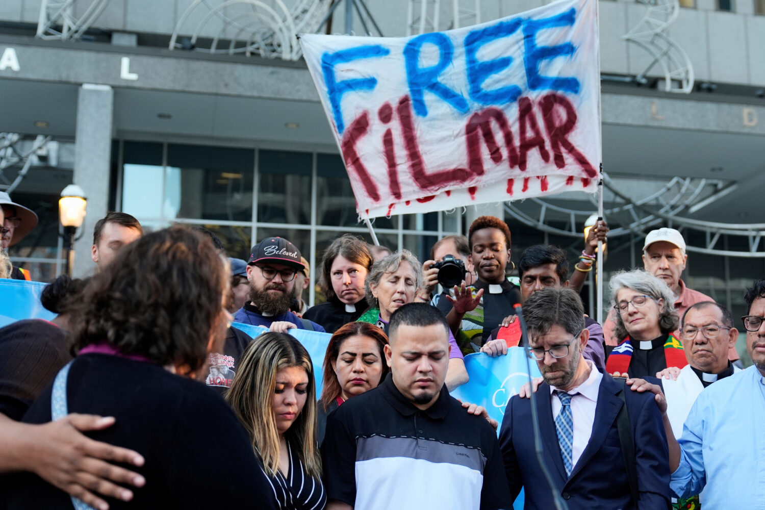FILE - Jennifer Vasquez Sura, front left, her husband Kilmar Abrego Garcia, front center, and Attor...