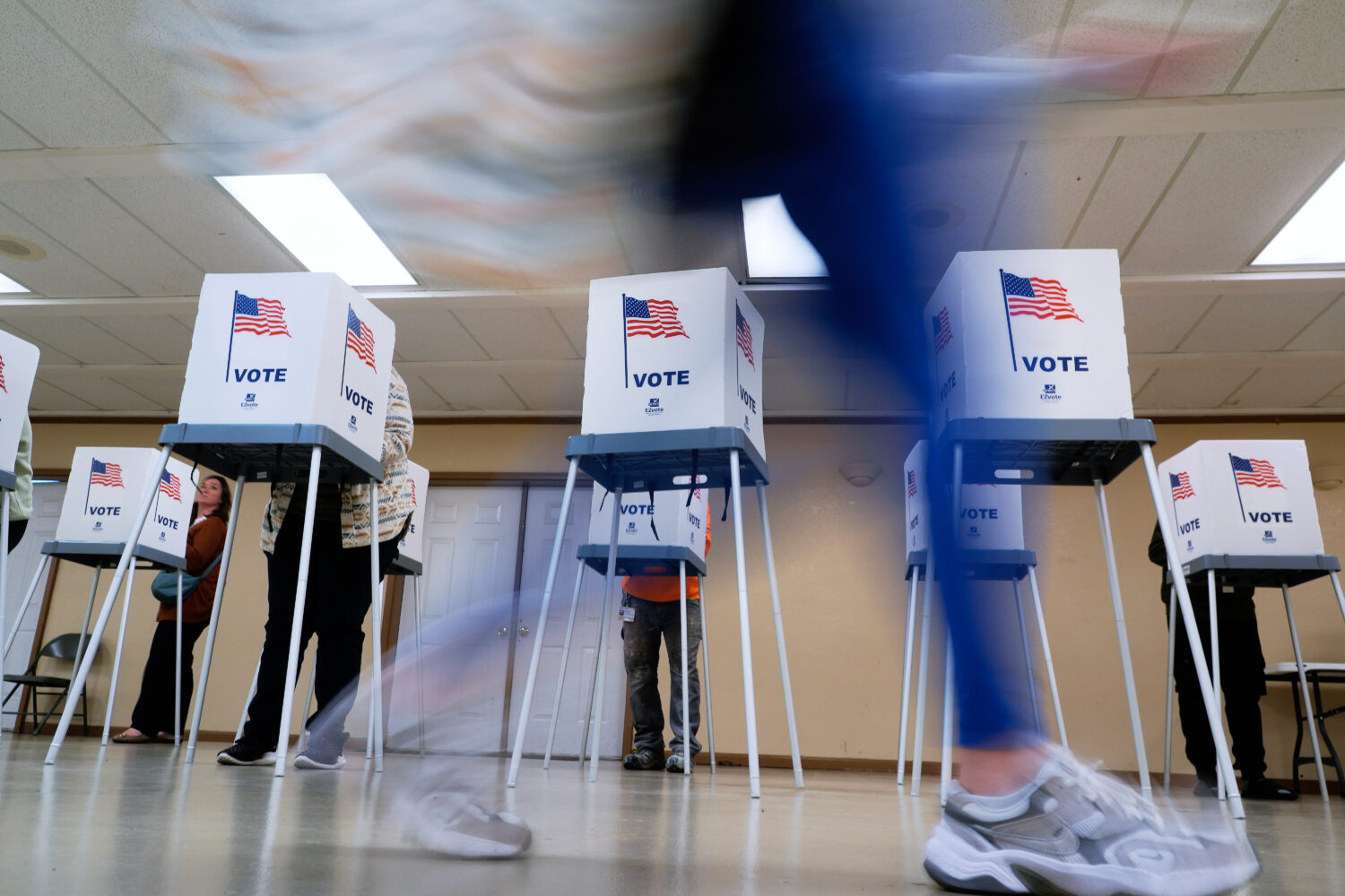 FILE - People vote, Nov. 5, 2024, in Oak Creek, Wis. (AP Photo/Morry Gash, File)Credit: ASSOCIATED ...