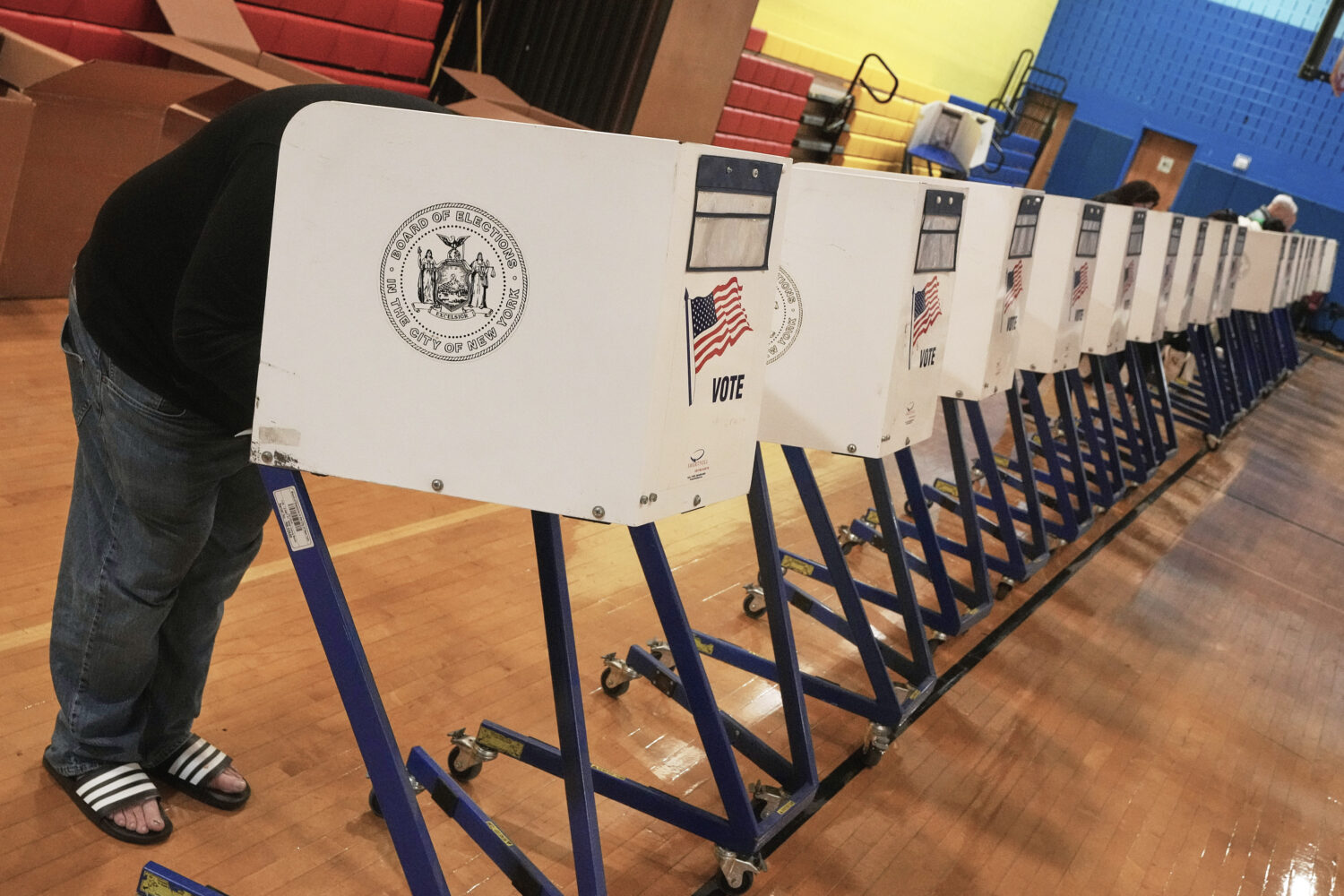 A voter completes their ballot at a voting site, in New York, Tuesday, Nov. 4, 2025. (AP Photo/Rich...