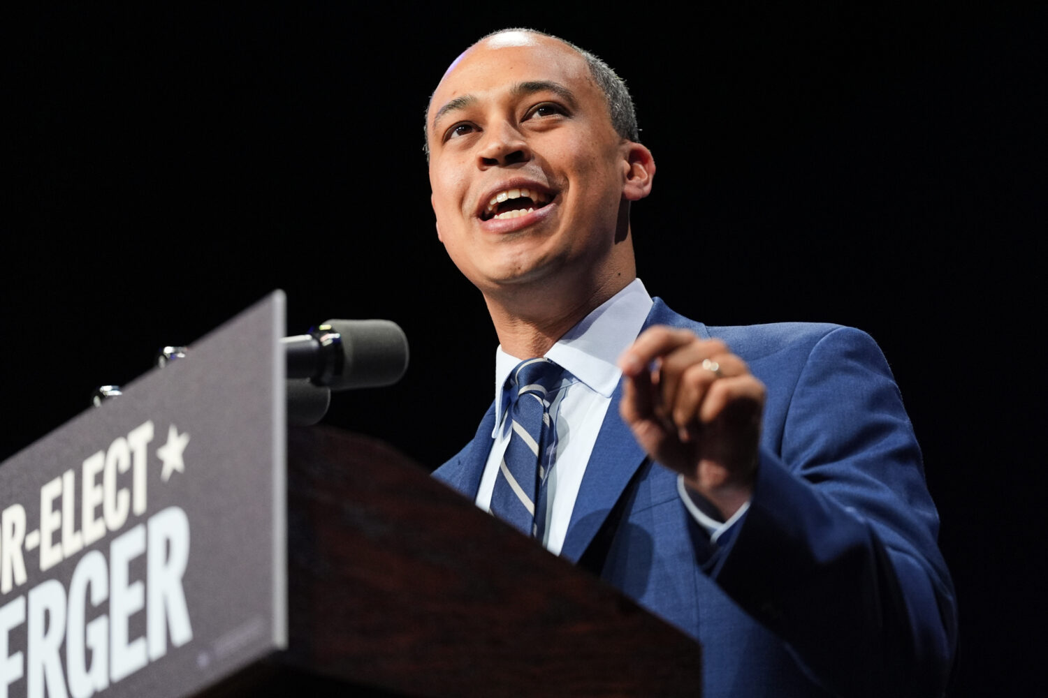 Democrat Jay Jones speaks on stage at an election night watch party for Democrat Abigail Spanberger...