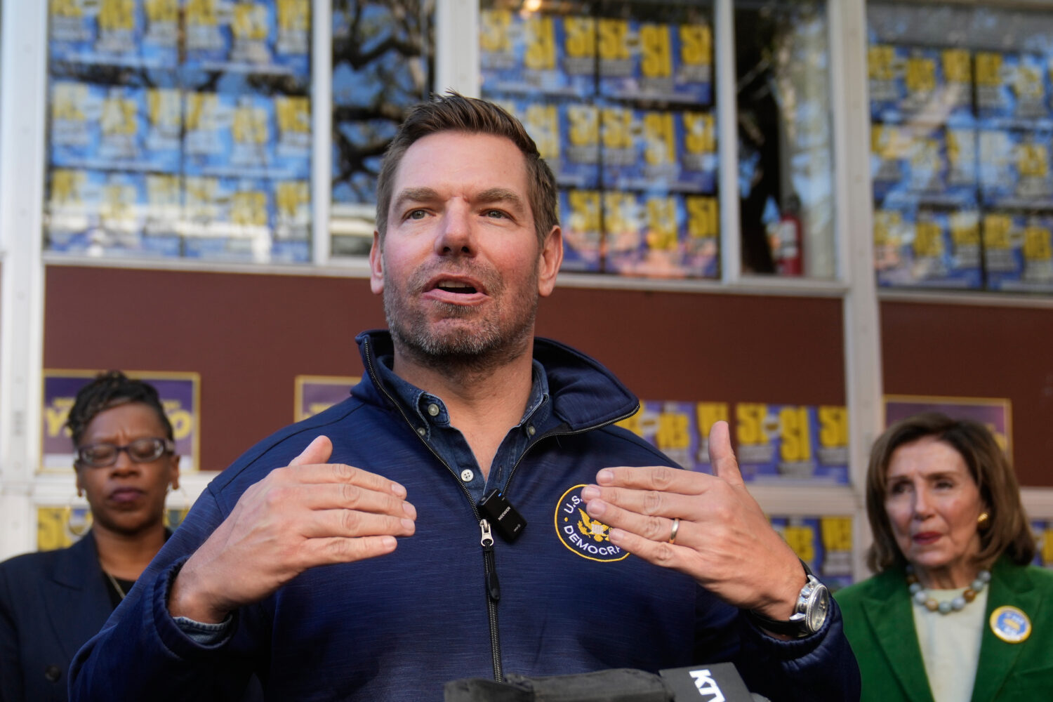 FILE - Rep. Eric Swalwell, D-Calif., speaks to reporters after a campaign event on Proposition 50 i...