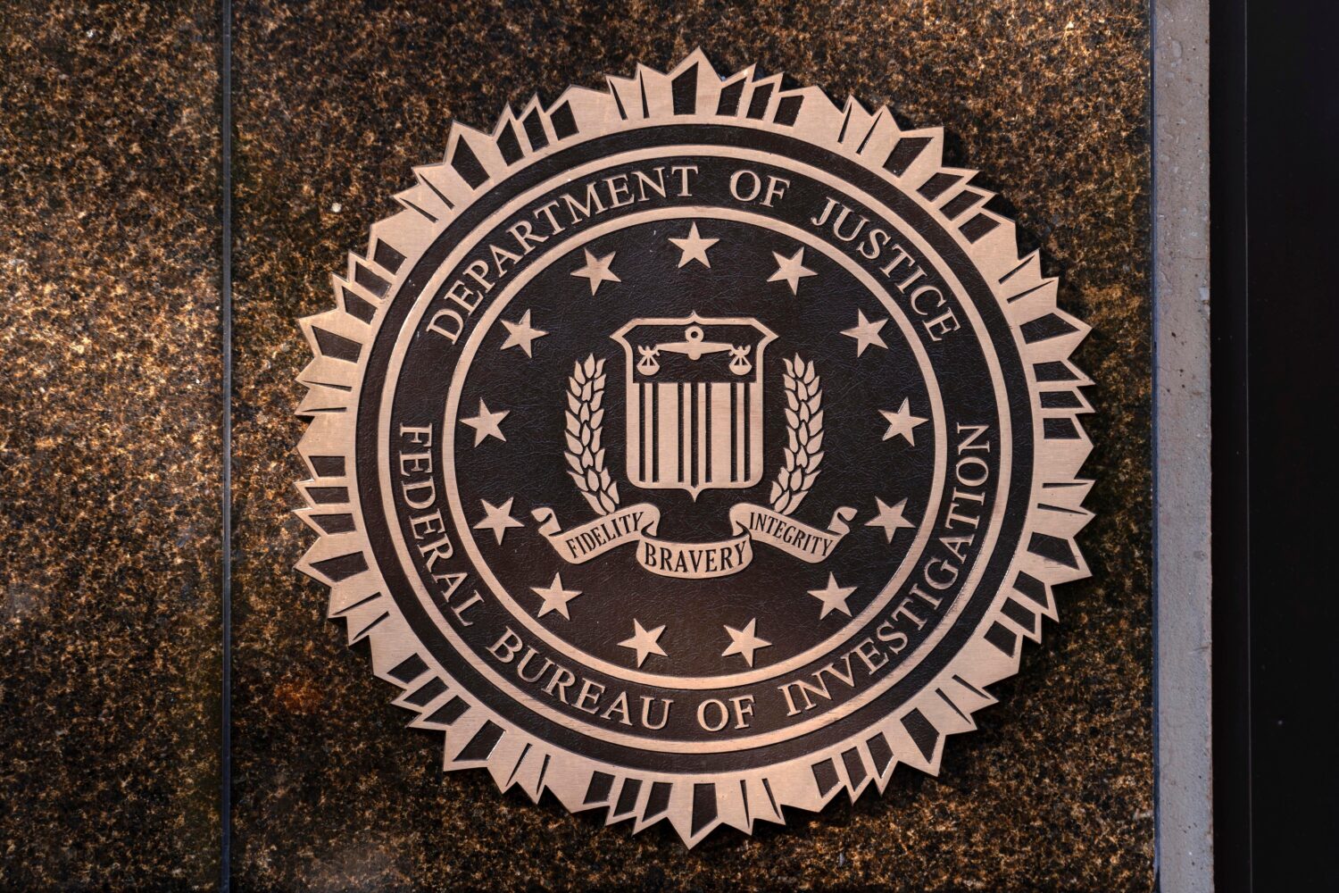 FILE - The seal of the Federal Bureau of Investigation is displayed at its headquarters in Washingt...