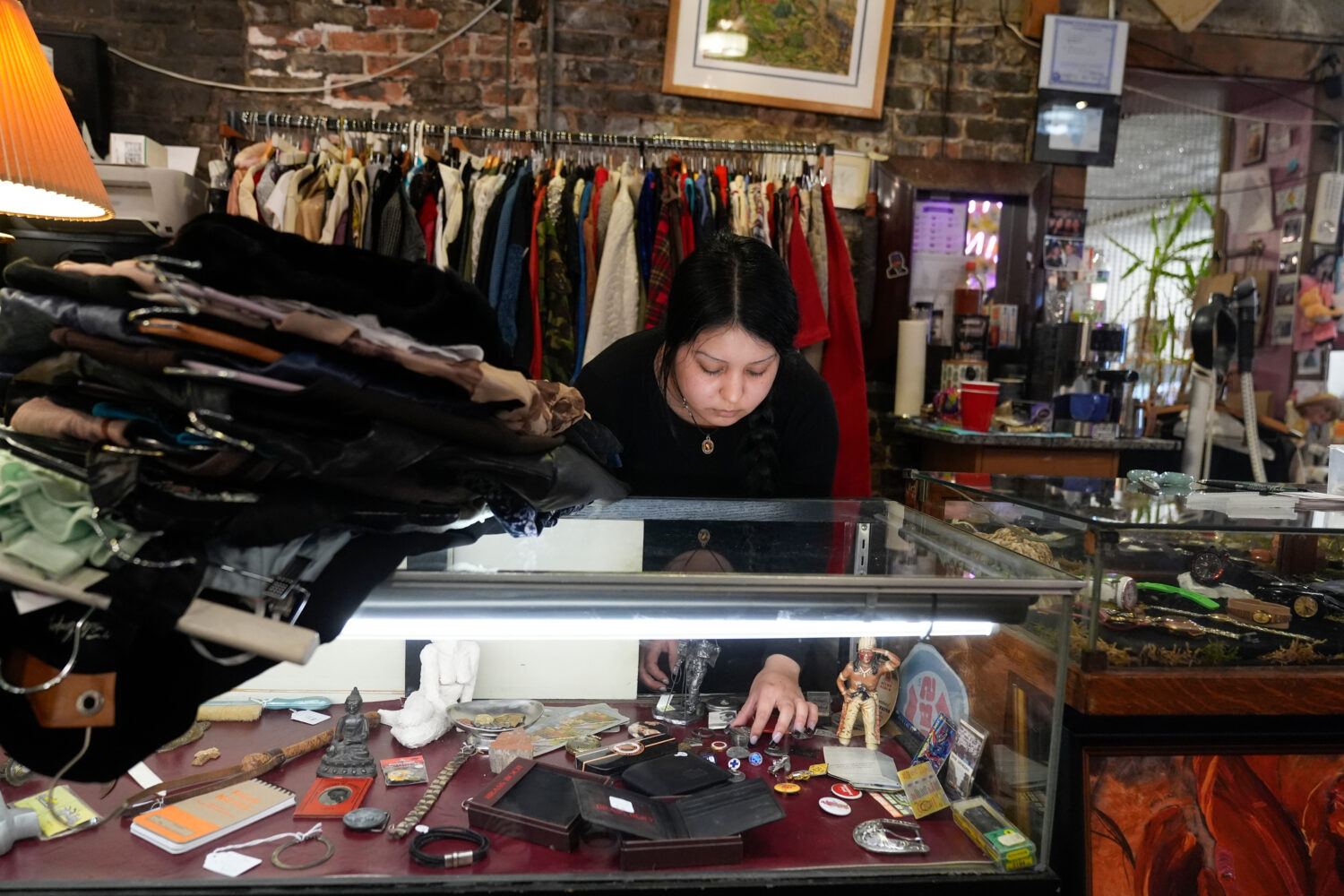 Satani Silva works at Pilsen Vintage, Wednesday, Nov. 19, 2025, in the Pilsen neighborhood of Chica...