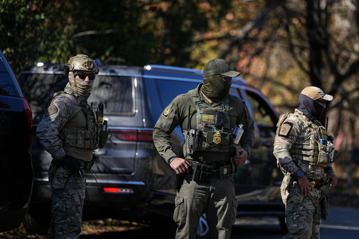 U.S. Border Patrol agents look on, Monday, Nov. 17, 2025, in Charlotte, N.C. (AP Photo/Matt Kelley)...