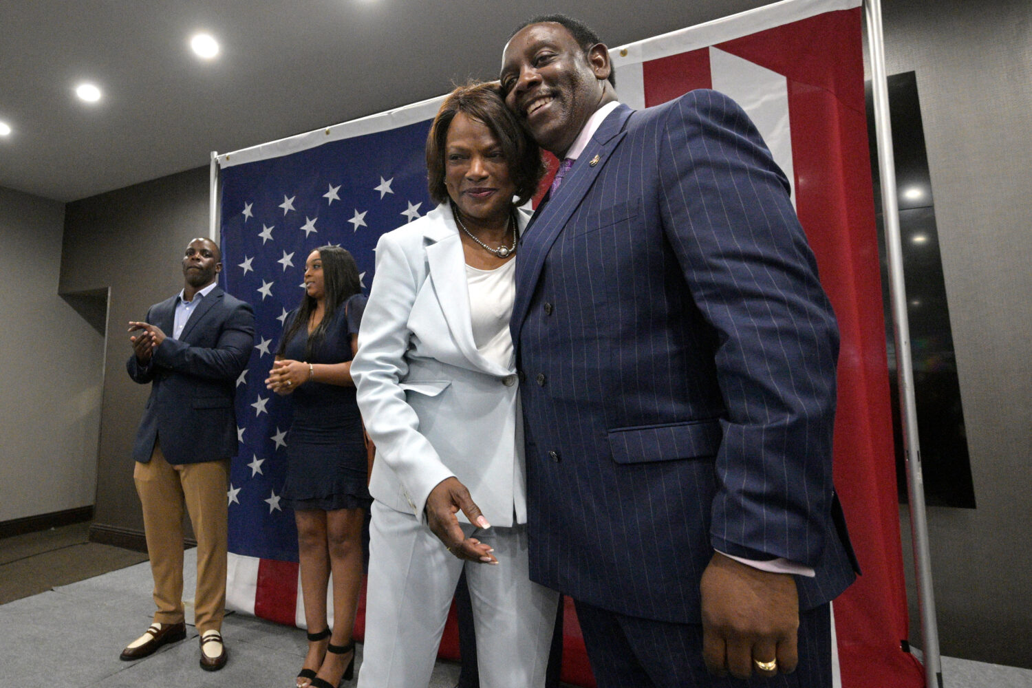 FILE - Rep. Val Demings, D-Fla., the Democratic candidate for the U.S. Senate, receives a hug from ...