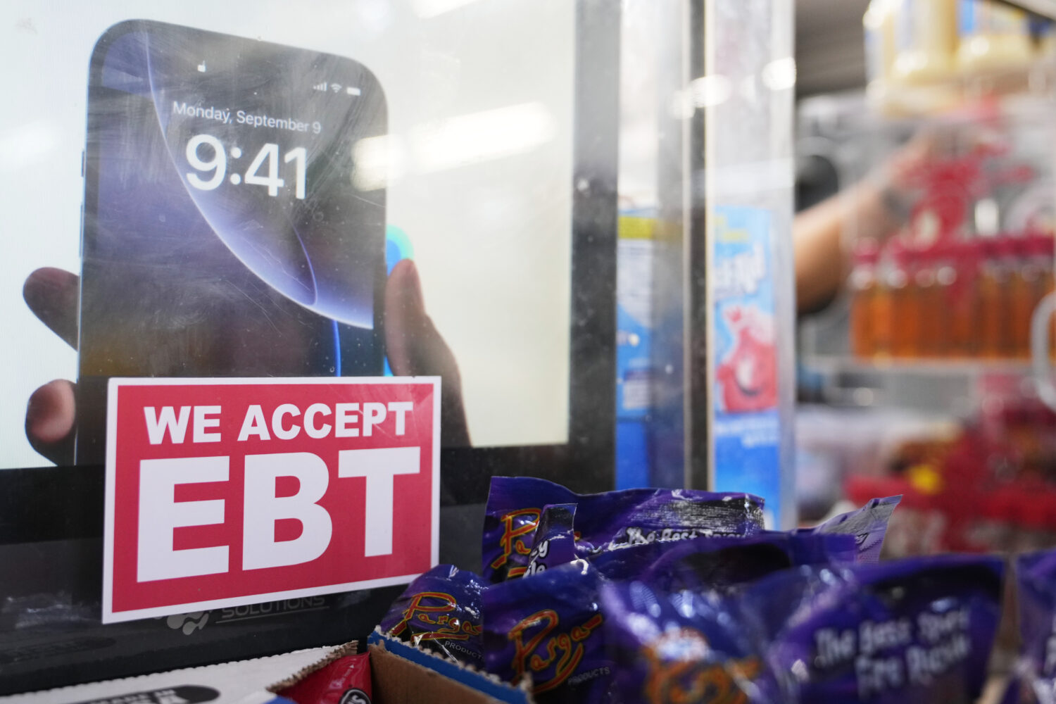 A sign is displayed for EBT for the USDA Supplemental Nutrition Assistance Program (SNAP) at the Fr...