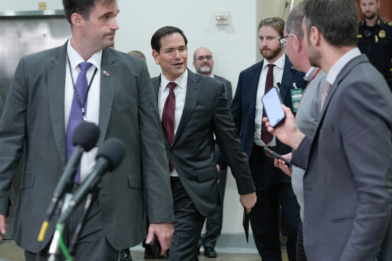 Secretary of State Marco Rubio, center, arrives to brief lawmakers on the U.S. military strikes on ...