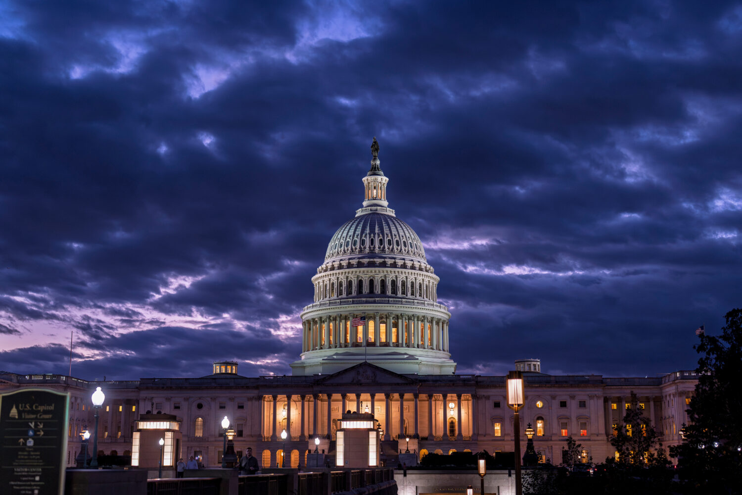 FILE - The Capitol is seen at nightfall on day 22 of a government shutdown in Washington, Oct. 22, ...