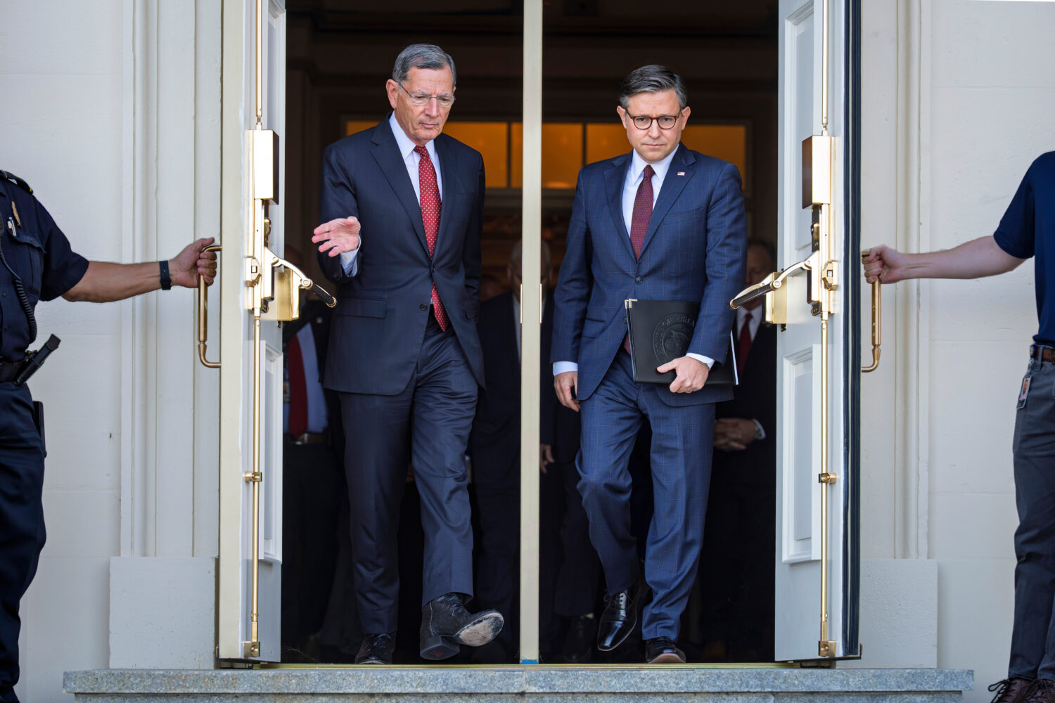 FILE - Sen. John Barrasso, R-Wyo., the Senate GOP whip, left, and Speaker of the House Mike Johnson...