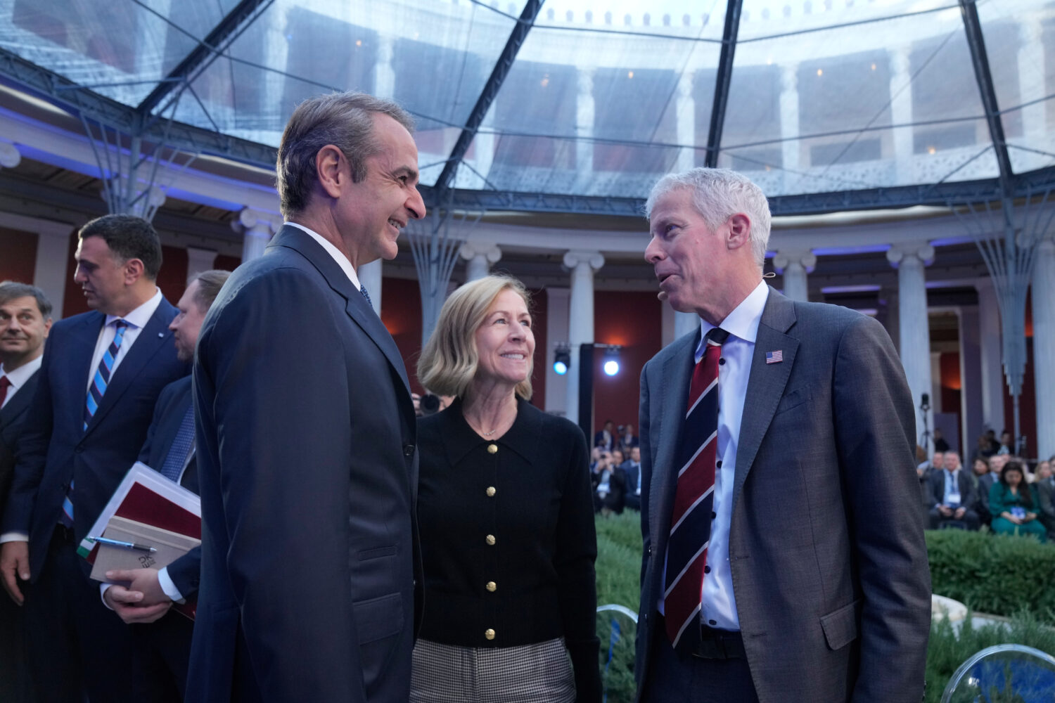 Greece's Prime Minister Kyriakos Mitsotakis, left, speak with Chris Wright, Secretary of the U.S. D...